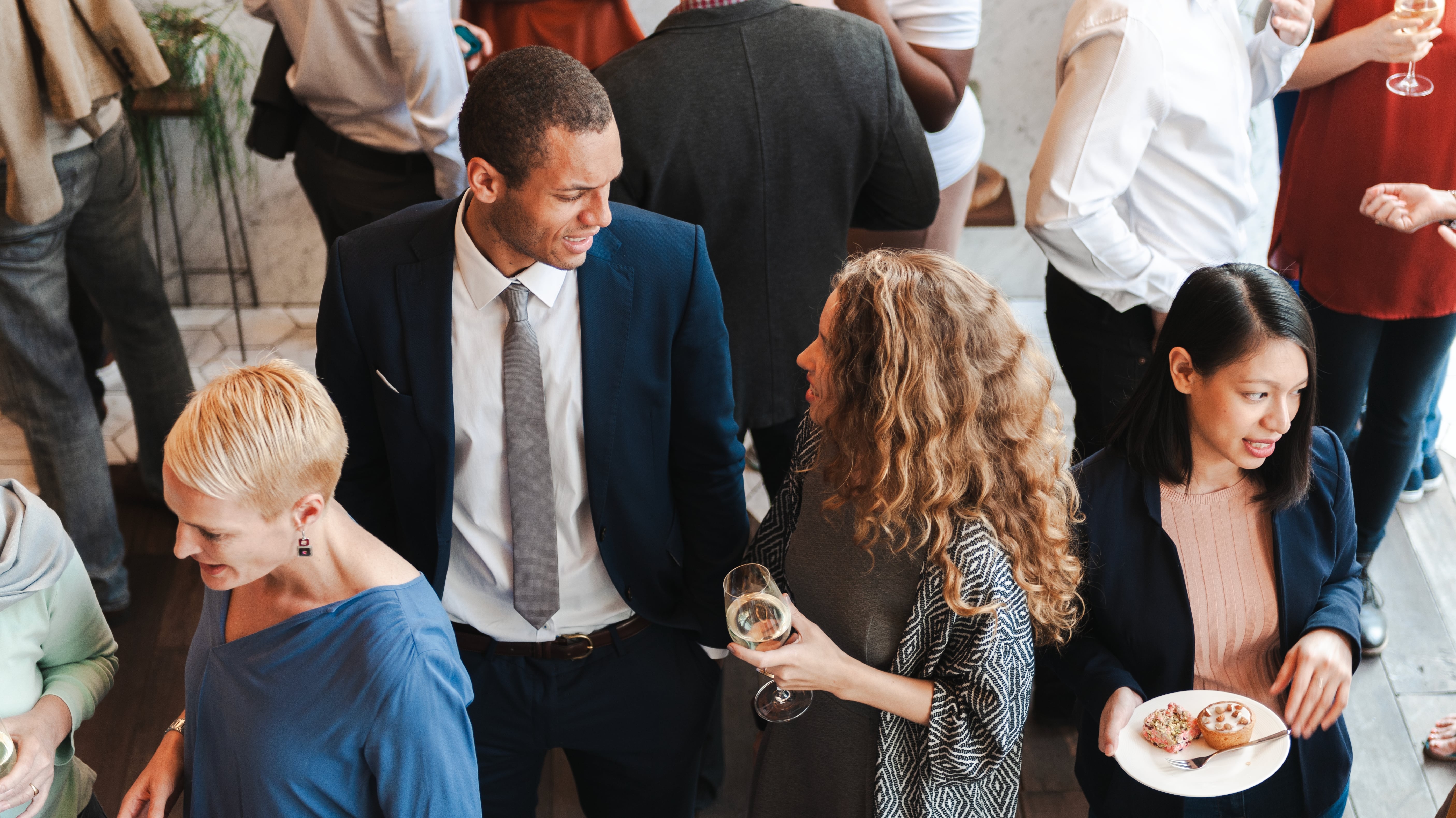 diverse-group-social-event-chatting-networking